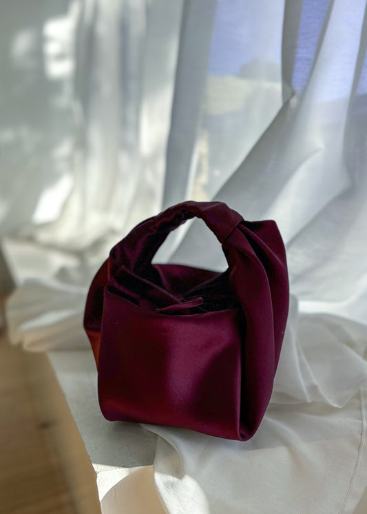Couture + Love + Madness parachute bag, merlot